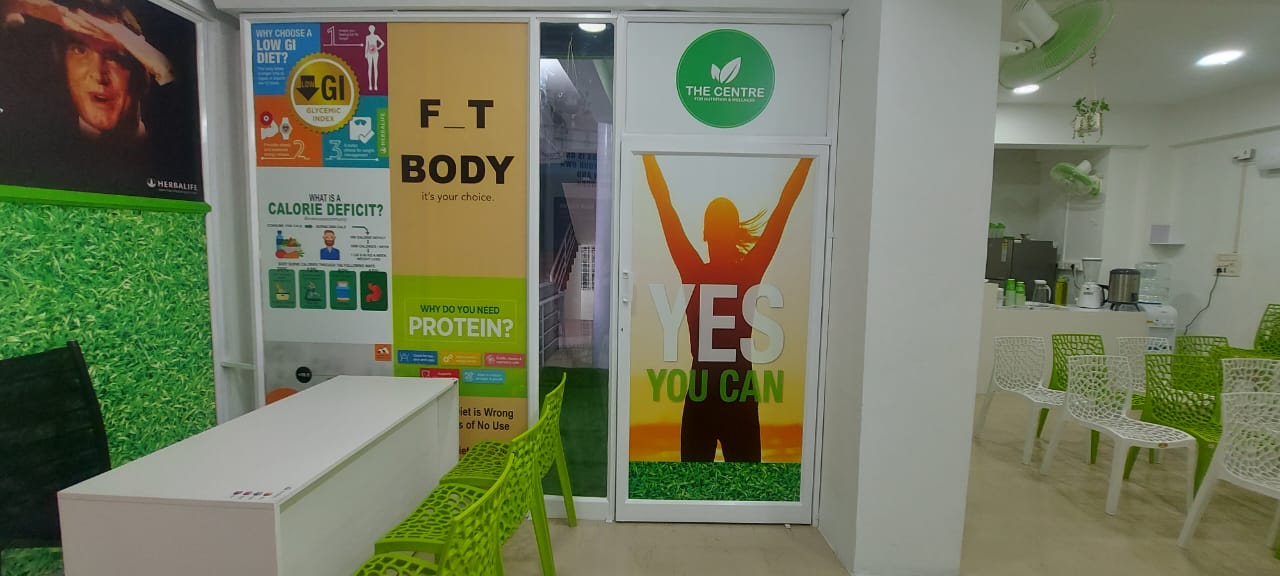 Welcoming interior with green branding